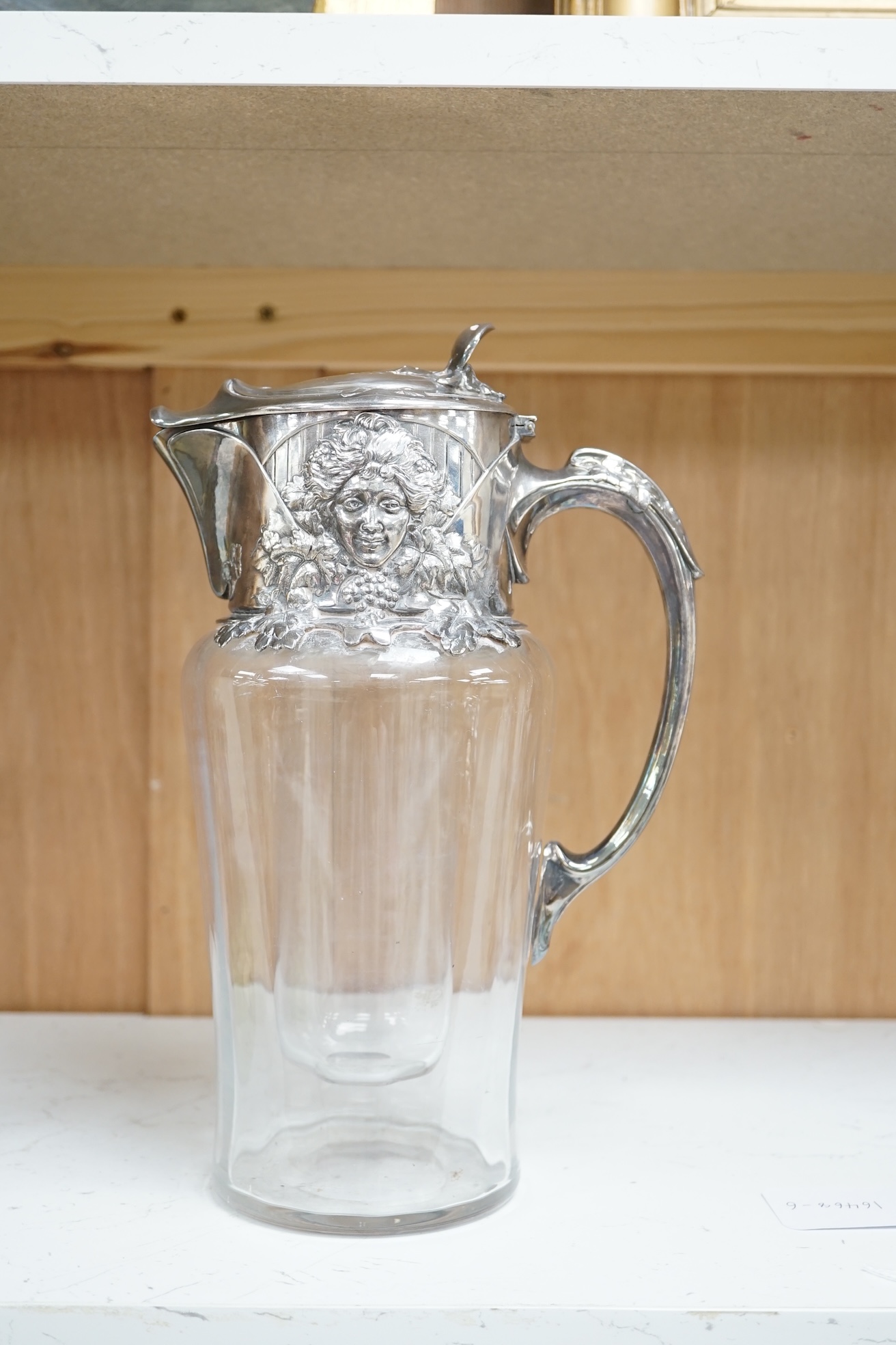 An Art Nouveau electroplate mounted Bacchanalian lemonade jug, 28cm. Condition - fair to good